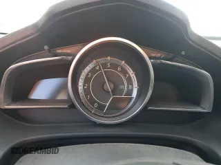 2016 Mazda 3 S Grand Touring z VIN JM1BM1N36G1342594, wystawiony jako Copart lot #57041185 z przebiegiem Nie podano mil oraz Szkoda całkowita • Salvage title. Historia ofert i sprzedaży dostępna na DreamBid. Obrazek 9.