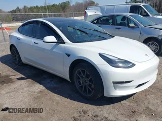 2023 Tesla Model 3 Long Range with VIN 5YJ3E1EB1PF393565, listed as a IAAI auction lot 41656060 with 16,236 mi miles and . Bid and sale history available at DreamBid. Image 1.