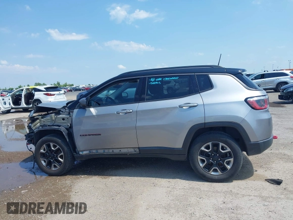 2018 Jeep Compass Trailhawk with VIN 3C4NJDDB2JT198784, listed as a IAAI auction lot 42405539 with 121,553 mi miles and . Bid and sale history available at DreamBid. Image 15.
