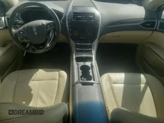 2013 Lincoln MKZ z VIN 3LN6L2J93DR800853, wystawiony jako Copart lot #65754965 z przebiegiem 87 322 mil mil oraz Szkoda całkowita • Salvage title. Historia ofert i sprzedaży dostępna na DreamBid. Obrazek 8.