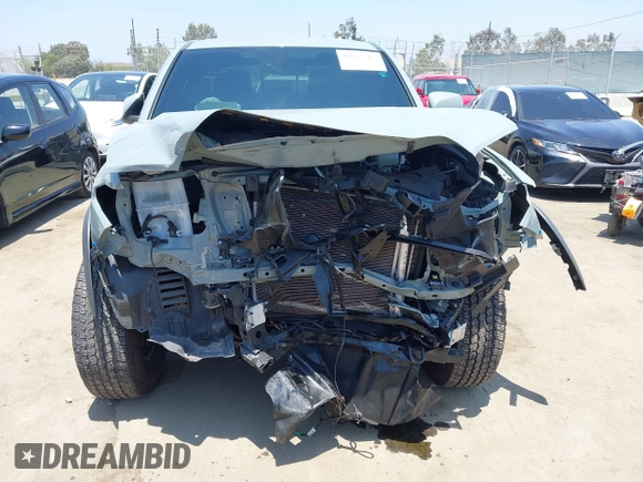 2022 Toyota Tacoma SR with VIN 3TYCZ5AN0NT104300, listed as a IAAI auction lot 42652503 with 18,071 mi miles and . Bid and sale history available at DreamBid. Image 6.