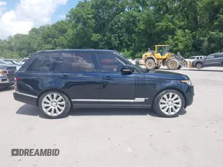 2015 Land Rover Range Rover Supercharged with VIN SALGS2TF1FA219503, listed as a IAAI auction lot 42580352 with 104,534 mi miles and . Bid and sale history available at DreamBid. Image 14.