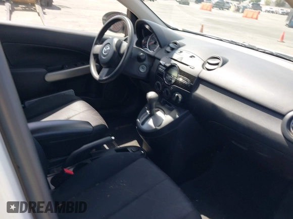 2014 Mazda 2 Sport with VIN JM1DE1KZ5E0171550, listed as a IAAI auction lot 41957824 with 70,838 mi miles and . Bid and sale history available at DreamBid. Image 5.