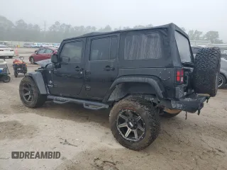 2015 Jeep Wrangler Unlimited Freedom with VIN 1C4BJWDG6FL568583, listed as a Copart auction lot 54266315 with Not provided miles and Salvage title. Bid and sale history available at DreamBid. Image 2.