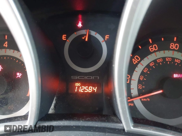 2014 Scion tC with VIN JTKJF5C78E3072572, listed as a IAAI auction lot 39680670 with 112,584 mi miles. Bid and sale history available at carsss.com. Image 7.