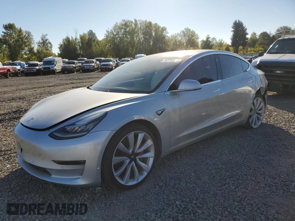 2018 Tesla Model 3 Long Range Battery with VIN 5YJ3E1EB4JF074295, listed as a Copart auction lot 74775384 with 83,515 mi miles and Salvage Title. Bid and sale history available at DreamBid. Image 1.