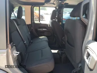 2018 Jeep Wrangler Unlimited Sahara with VIN 1C4HJXEN2JW220882, listed as a Copart auction lot 57428525 with 94,046 mi miles and Salvage title. Bid and sale history available at DreamBid. Image 11.