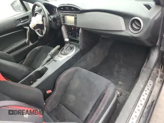 2015 Scion FR-S z VIN JF1ZNAA12F8711821, wystawiony jako Copart lot #59886505 z przebiegiem 115 796 mil mil oraz Szkoda całkowita • Salvage title. Historia ofert i sprzedaży dostępna na DreamBid. Obrazek 8.