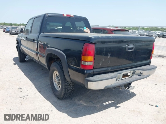2003 GMC Sierra 1500HD SLE z VIN 1GTGK13U63F136146, wystawiony jako IAAI lot #42020608 z przebiegiem 170 466 mil mil oraz . Historia ofert i sprzedaży dostępna na DreamBid. Obrazek 3.