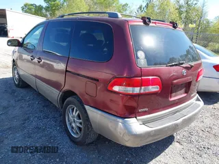 2001 Toyota Sienna LE with VIN 4T3ZF13C61U336492, listed as a IAAI auction lot 41896586 with 191,571 mi miles. Bid and sale history available at carsss.com. Image 3.