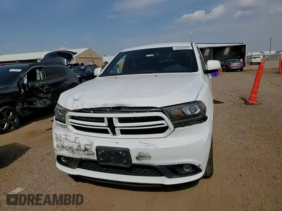 2014 Dodge Durango Limited with VIN 1C4RDJDG7EC599249, listed as a Copart auction lot 65560865 with 93,049 mi miles and Salvage title. Bid and sale history available at DreamBid. Image 14.