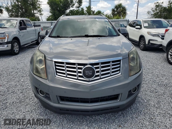 2014 Cadillac SRX Premium Collection z VIN 3GYFNGE30ES627895, wystawiony jako Copart lot #58605985 z przebiegiem 49 300 mil mil oraz Szkoda całkowita • Salvage title. Historia ofert i sprzedaży dostępna na DreamBid. Obrazek 5.