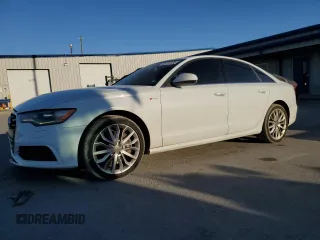 2014 Audi A6 3.0T Prestige with VIN WAUHGAFC1EN037698, listed as a Copart auction lot 45731955 with 128,050 mi miles and Clean Title. Bid and sale history available at carsss.com. Image 1.