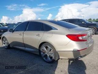 2020 Honda Accord Touring with VIN 1HGCV2F99LA029545, listed as a IAAI auction lot 40472177 with 44,960 mi miles and . Bid and sale history available at DreamBid. Image 14.
