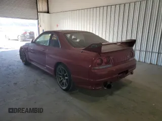 1997 Nissan Skyline z VIN BCNR33042682, wystawiony jako Copart lot #76562674 z przebiegiem 61 791 mil mil oraz Czysty tytuł • Clean title. Historia ofert i sprzedaży dostępna na DreamBid. Obrazek 2.