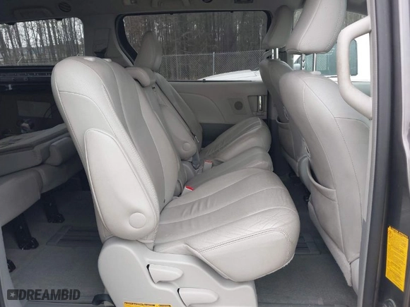 2012 Toyota Sienna XLE AAS with VIN 5TDYK3DC2CS276118, listed as a IAAI auction lot 41834422 with 143,043 mi miles. Bid and sale history available at carsss.com. Image 8.