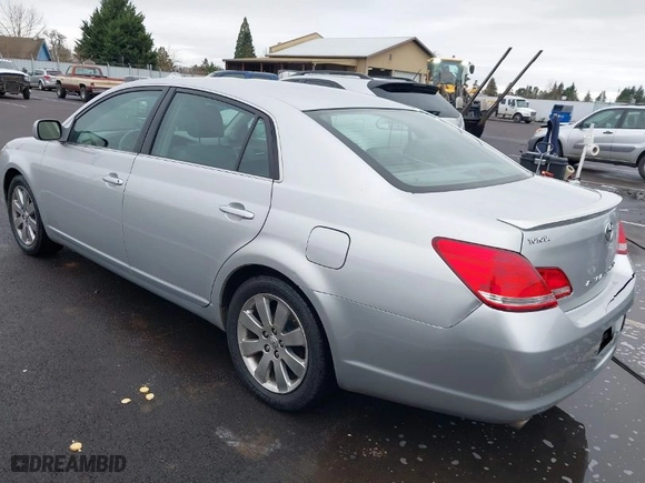 2005 Toyota Avalon XL with VIN 4T1BK36B85U027746, listed as a IAAI auction lot 41609354 with 183,844 mi miles. Bid and sale history available at carsss.com. Image 3.