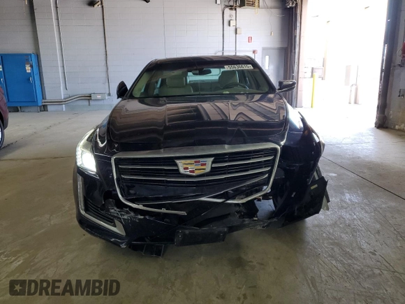 2016 Cadillac CTS Luxury Collection AWD with VIN 1G6AX5SS6G0126033, listed as a Copart auction lot 55636615 with 76,113 mi miles and Salvage title. Bid and sale history available at DreamBid. Image 5.
