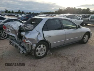2002 Honda Accord LX z VIN JHMCG55432C034824, wystawiony jako Copart lot #83174914 z przebiegiem 193 883 mil mil oraz Szkoda całkowita • Salvage title. Historia ofert i sprzedaży dostępna na DreamBid. Obrazek 3.
