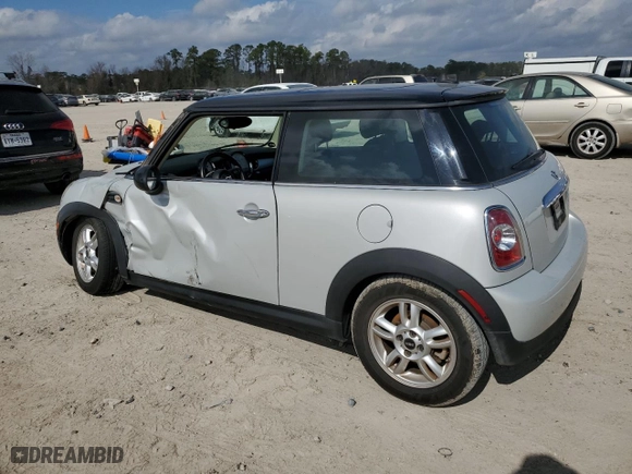2011 MINI Cooper Hardtop with VIN WMWSU3C5XBTX96096, listed as a Copart auction lot 43148125 with 94,938 mi miles and Salvage Title. Bid and sale history available at carsss.com. Image 2.