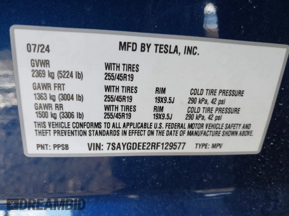 2024 Tesla Model Y Long Range with VIN 7SAYGDEE2RF129577, listed as a IAAI auction lot 41357180 with 6,697 mi miles and . Bid and sale history available at DreamBid. Image 9.