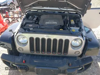 2015 Jeep Wrangler Unlimited Sport z VIN 1C4BJWDG0FL745533, wystawiony jako IAAI lot #41844126 z przebiegiem 151 620 mil mil oraz . Historia ofert i sprzedaży dostępna na DreamBid. Obrazek 10.