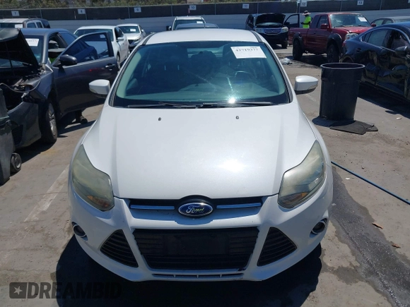 2014 Ford Focus Titanium with VIN 1FADP3N27EL330366, listed as a IAAI auction lot 42719377 with 97,009 mi miles and . Bid and sale history available at DreamBid. Image 6.