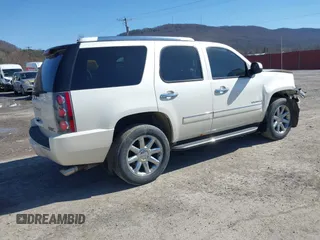 2011 GMC Yukon Denali with VIN 1GKS2EEF8BR237643, listed as a IAAI auction lot 41811822 with 134,309 mi miles. Bid and sale history available at carsss.com. Image 4.