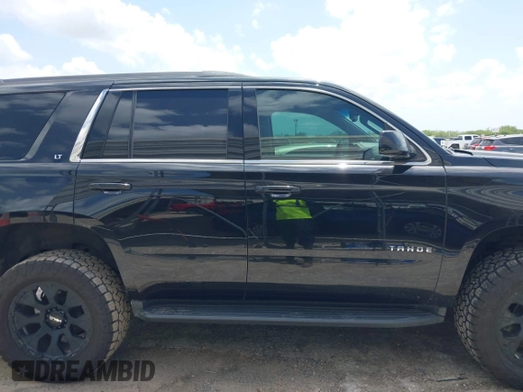 2018 Chevrolet Tahoe LT with VIN 1GNSCBKC9JR133640, listed as a IAAI auction lot 42542381 with 130,154 mi miles and . Bid and sale history available at DreamBid. Image 13.