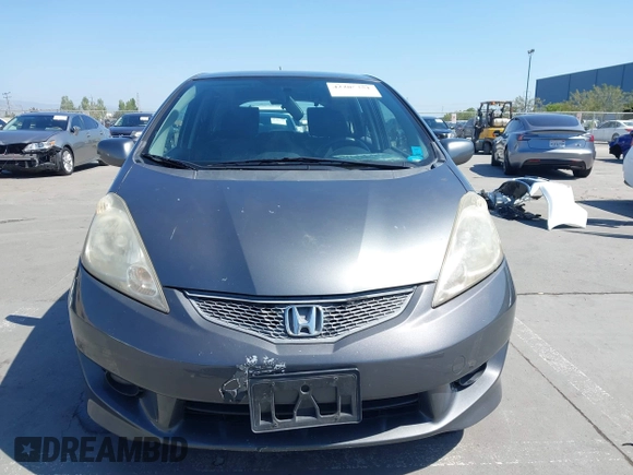 2011 Honda Fit Sport with VIN JHMGE8H52BC006588, listed as a IAAI auction lot 42205351 with 178,981 mi miles and . Bid and sale history available at DreamBid. Image 12.
