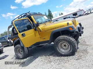2003 Jeep Wrangler Rubicon with VIN 1J4FA69S93P302102, listed as a IAAI auction lot 42312951 with 146,408 mi miles and . Bid and sale history available at DreamBid. Image 13.