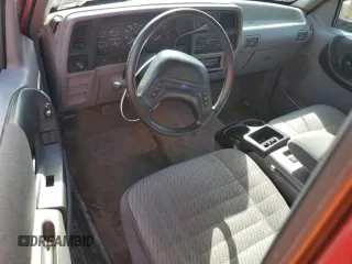 1994 Ford Ranger XLT with VIN 1FTCR15X5RTA87551, listed as a Copart auction lot 46115505 with 143,063 mi miles and Salvage Title. Bid and sale history available at DreamBid. Image 8.