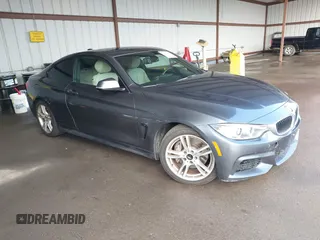 2015 BMW 4 Series 435i with VIN WBA3R1C59FK194649, listed as a IAAI auction lot 41565414 with 123,702 mi miles and . Bid and sale history available at carsss.com. Image 1.