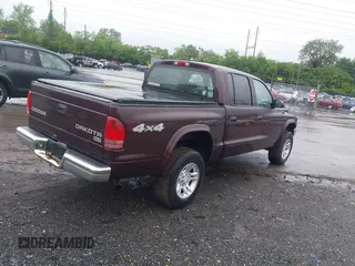 2004 Dodge Dakota SLT with VIN 1D7HG48N04S718220, listed as a IAAI auction lot 42258803 with 250,757 mi miles and . Bid and sale history available at DreamBid. Image 4.