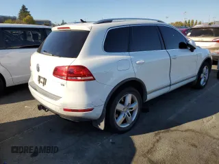 2012 Volkswagen Touareg Exec with VIN WVGEF9BP1CD010015, listed as a Copart auction lot 72646154 with 163,502 mi miles and Salvage Title. Bid and sale history available at DreamBid. Image 3.