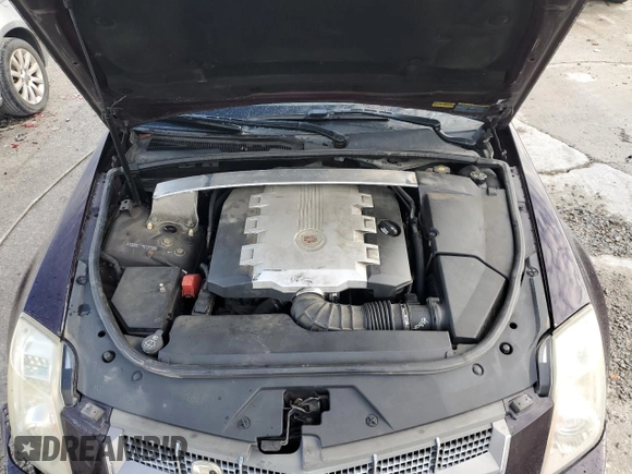 2009 Cadillac CTS AWD z VIN 1G6DG577190129300, wystawiony jako Copart lot #55802785 z przebiegiem 166 399 mil mil oraz Szkoda całkowita • Salvage title. Historia ofert i sprzedaży dostępna na DreamBid. Obrazek 11.