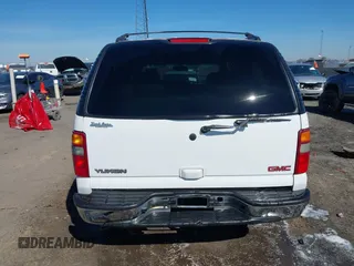 2003 GMC Yukon SLT with VIN 1GKEC13Z13J197955, listed as a IAAI auction lot 41586841 with 208,752 mi miles. Bid and sale history available at carsss.com. Image 16.