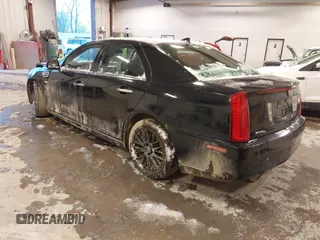 2010 Cadillac STS AWD with VIN 1G6DU6EV2A0125065, listed as a IAAI auction lot 41229886 with 84,954 mi miles and . Bid and sale history available at DreamBid. Image 3.