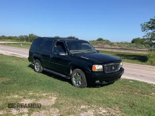 2000 Cadillac Escalade с VIN 1GYEK63R4YR218974, выставлен на аукционе Copart как лот 64570765 с пробегом 222 993 миль миль и Чистый • Clean title. История ставок и продаж доступна на DreamBid. Изображение 1.