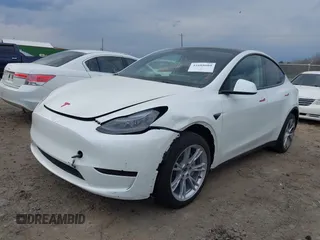 2023 Tesla Model Y Long Range with VIN 7SAYGDEE2PF765395, listed as a IAAI auction lot 41688080 with 27,792 mi miles and . Bid and sale history available at DreamBid. Image 24.