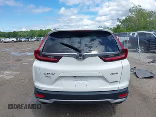 2020 Honda CR-V Touring z VIN 2HKRW2H97LH676151, wystawiony jako IAAI lot #42340956 z przebiegiem 32 492 mil mil oraz . Historia ofert i sprzedaży dostępna na DreamBid. Obrazek 16.