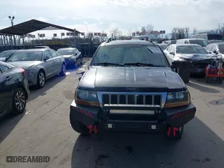 2004 Jeep Grand Cherokee Limited with VIN 1J4GW58N74C120435, listed as a IAAI auction lot 41815094 with 193,056 mi miles. Bid and sale history available at carsss.com. Image 12.
