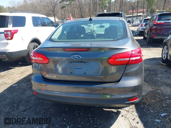 2017 Ford Focus S z VIN 1FADP3E29HL269607, wystawiony jako IAAI lot #41654836 z przebiegiem 101 645 mil mil oraz . Historia ofert i sprzedaży dostępna na DreamBid. Obrazek 16.