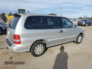 2005 Kia Sedona LX with VIN KNDUP132X56721558, listed as a Copart auction lot 88574685 with 176,660 mi miles and Salvage Title. Bid and sale history available at carsss.com. Image 3.