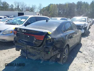 2022 Kia Forte LXS z VIN 3KPF24AD9NE437331, wystawiony jako IAAI lot #41875582 z przebiegiem 41 171 mil mil oraz . Historia ofert i sprzedaży dostępna na DreamBid. Obrazek 4.
