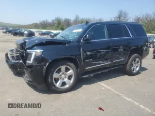 2020 Chevrolet Tahoe LT with VIN 1GNSKBKC5LR223132, listed as a Copart auction lot 60055325 with 48,166 mi miles and Salvage title. Bid and sale history available at DreamBid. Image 1.