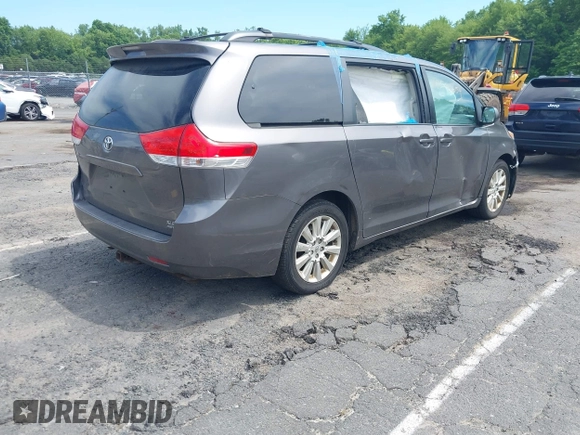 2011 Toyota Sienna XLE with VIN 5TDDK3DC8BS028176, listed as a IAAI auction lot 42592654 with 161,992 mi miles and . Bid and sale history available at DreamBid. Image 4.