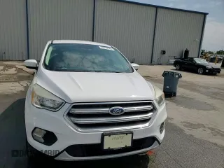 2017 Ford Escape SE z VIN 1FMCU0GD9HUE38848, wystawiony jako Copart lot #56859745 z przebiegiem 69 404 mil mil oraz Szkoda całkowita • Salvage title. Historia ofert i sprzedaży dostępna na DreamBid. Obrazek 15.