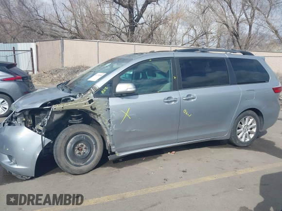 2015 Toyota Sienna XLE with VIN 5TDYK3DC2FS640204, listed as a IAAI auction lot 41772349 with 104,156 mi miles. Bid and sale history available at carsss.com. Image 15.