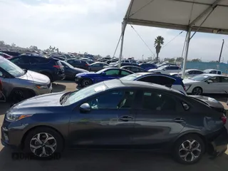 2021 Kia Forte FE with VIN 3KPF24AD6ME387387, listed as a IAAI auction lot 42034607 with 28,554 mi miles and . Bid and sale history available at carsss.com. Image 15.